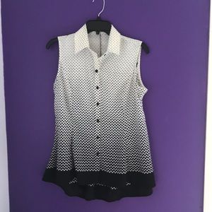 Sleeveless blouse size medium longer in back